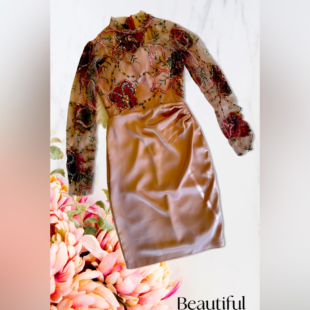 New Designer Beautiful beaded mini dress. Importad from famous designer Ingy